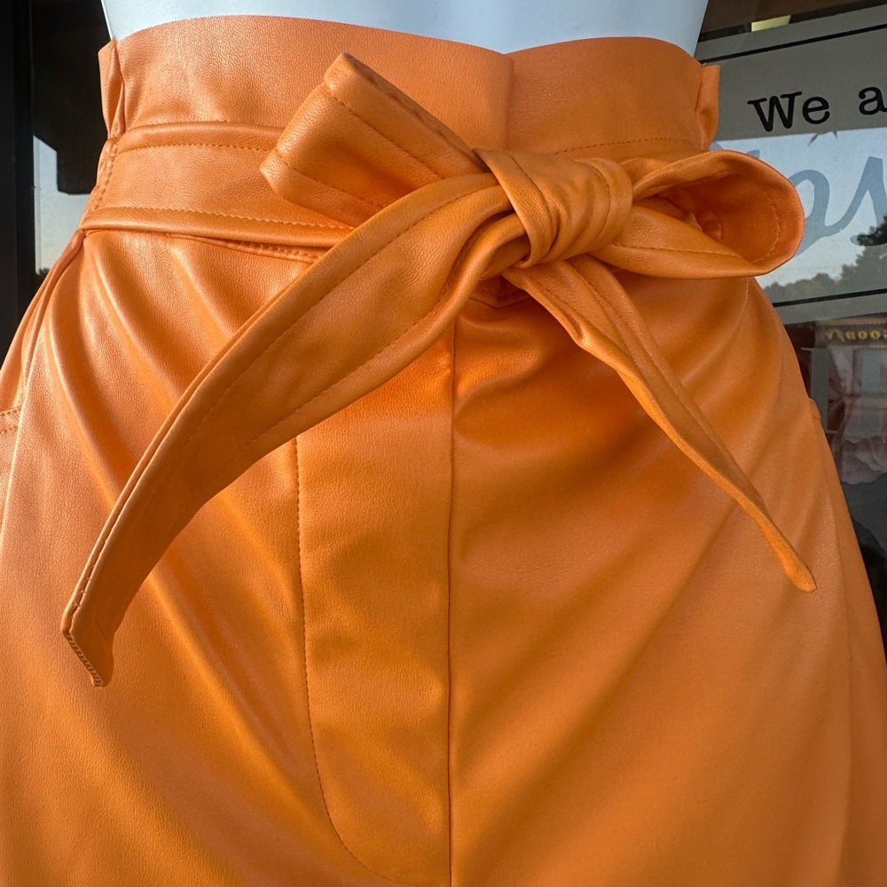 Elegant Orange faux leather shorts